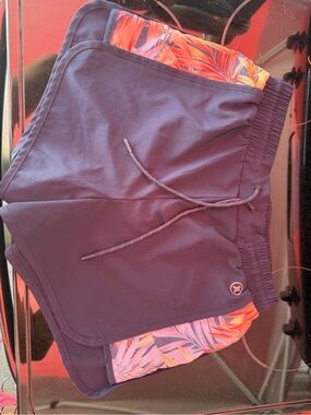 Hurley Women's Double-Layer Athletic Shorts in Navy with Tropical Accent